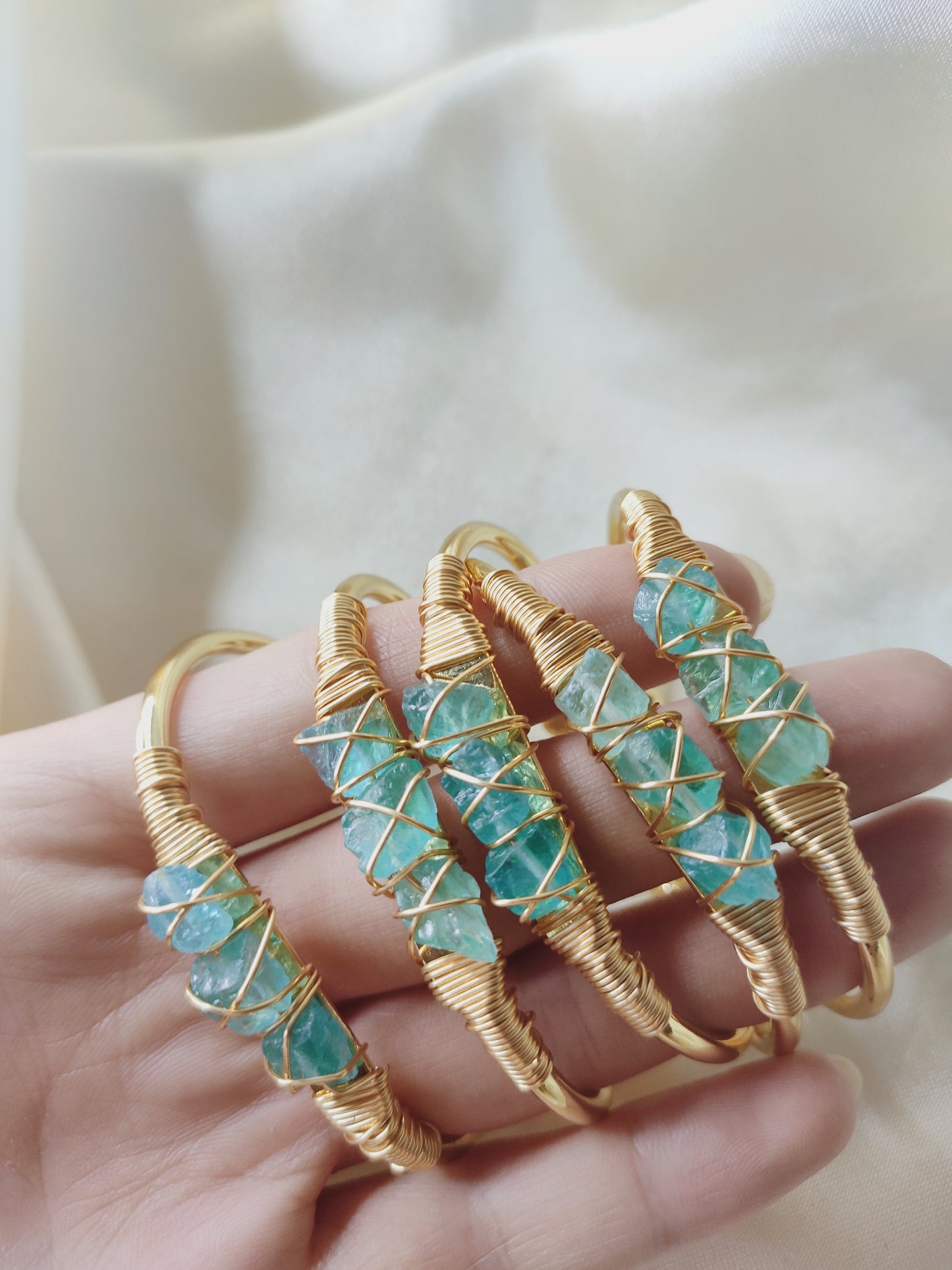 Crossed Wire Blue Apatite Gold bracelet